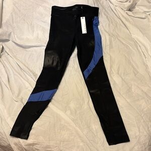 Shiny Koral leggings. Brand new with tags. Size small.